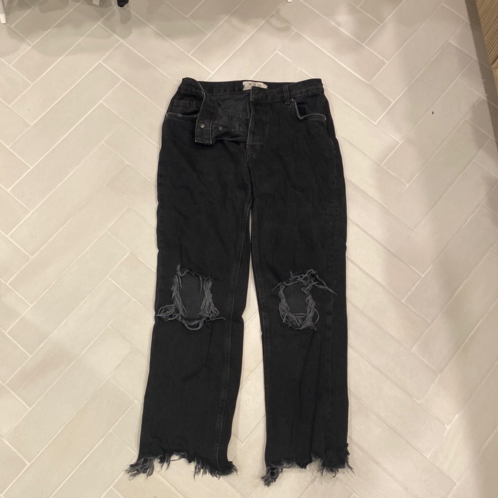 Women’s black distressed free people jeans, size 25